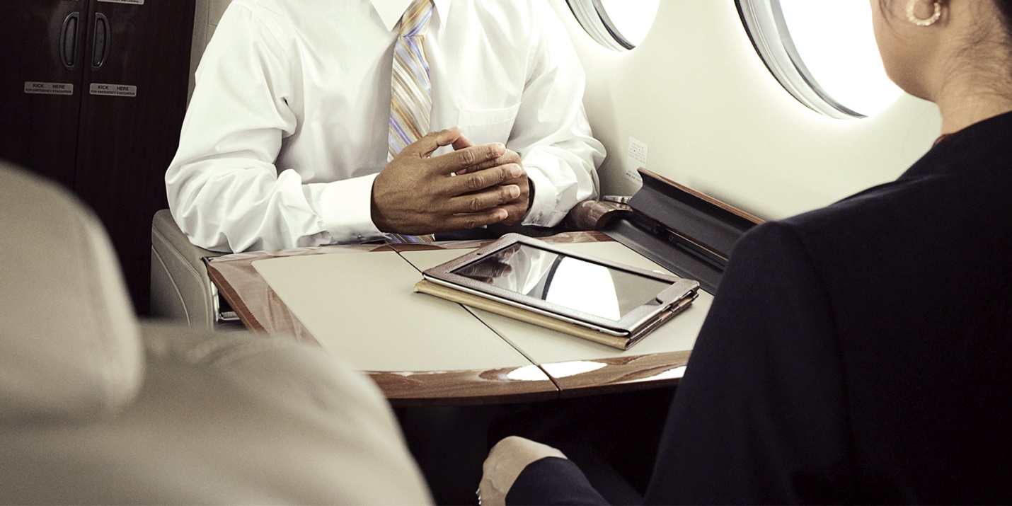 Business meeting in an aircraft