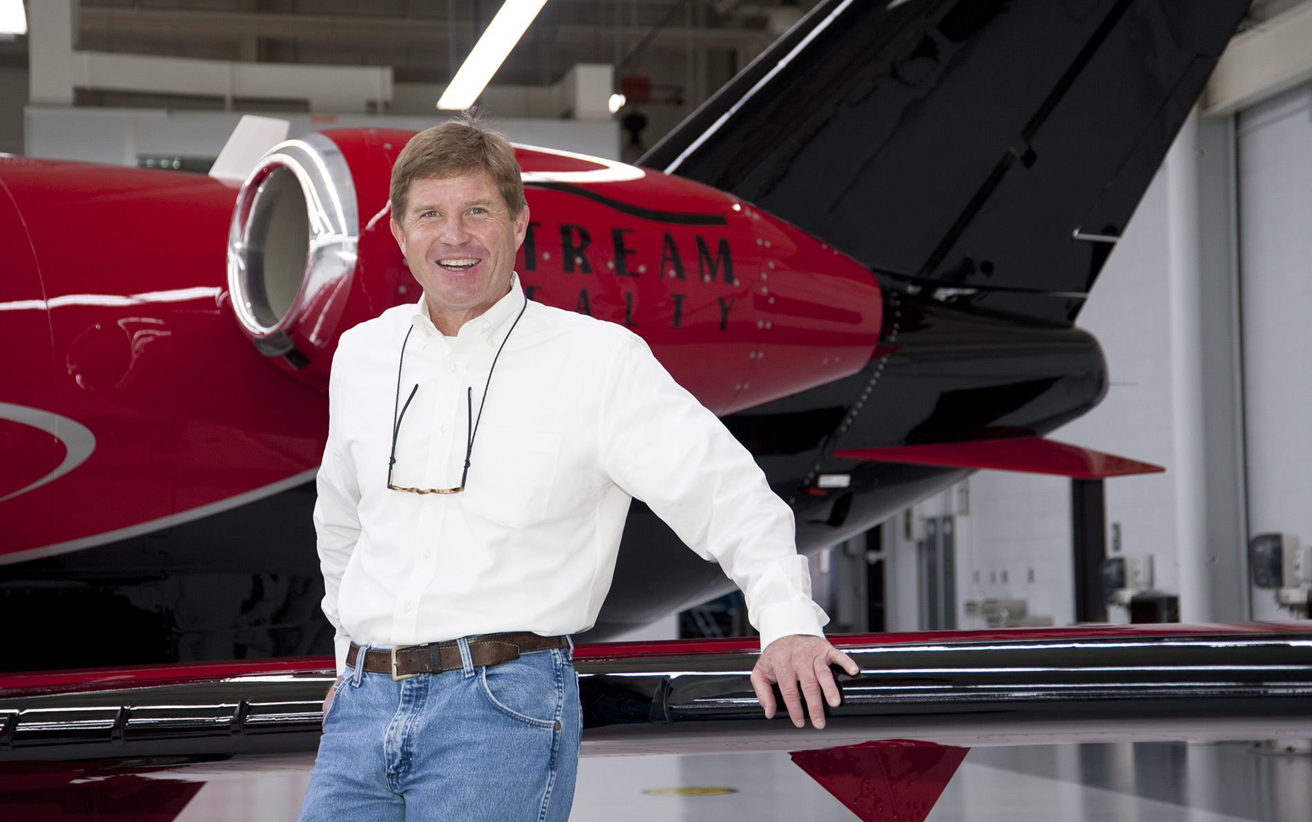 Mike McVean standing in front of his Citation Mustang