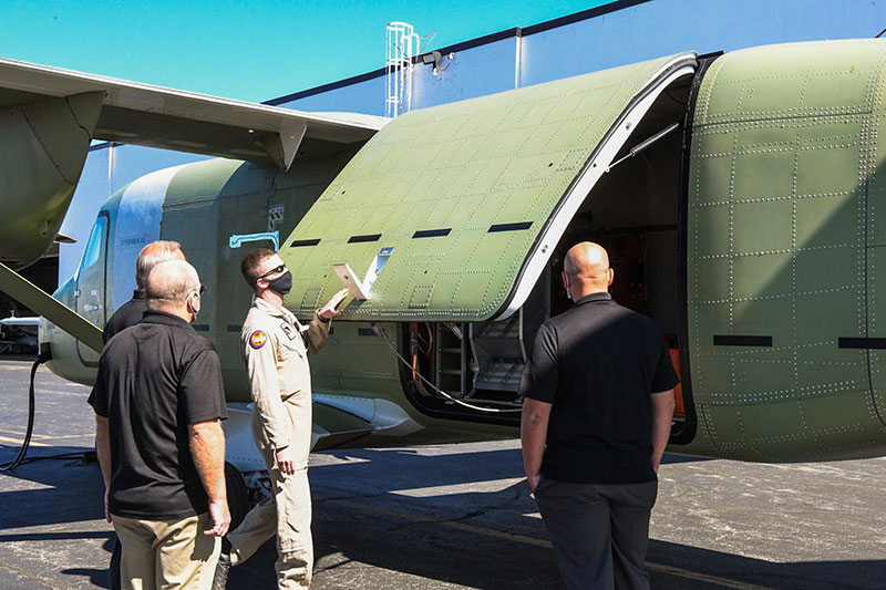 Opening cargo door of Cessna SkyCourier.