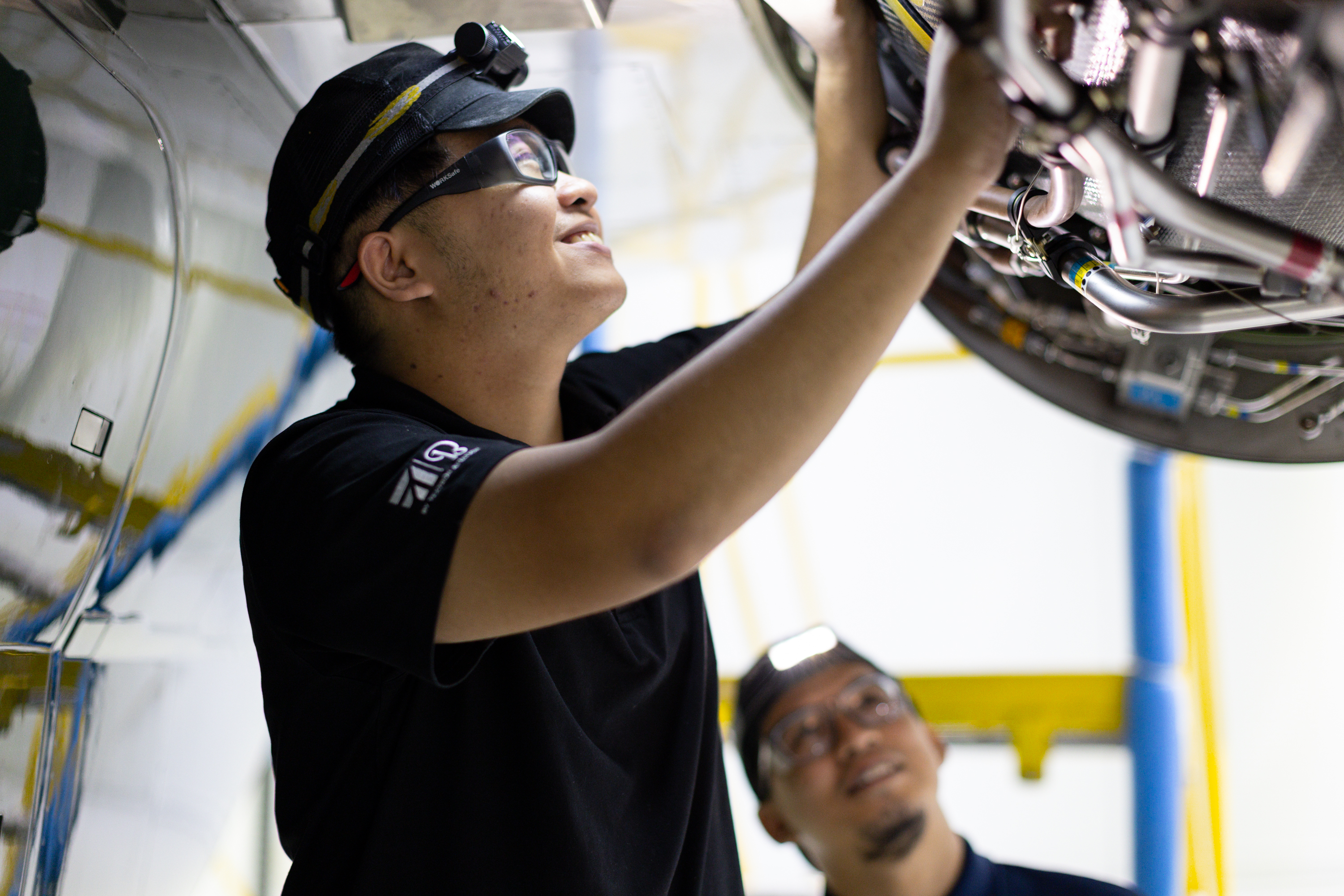 Technician working on a plane